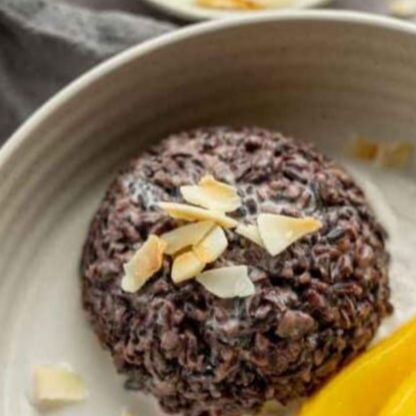 Black Sticky Rice With Coconut Cream On Top With Lychee